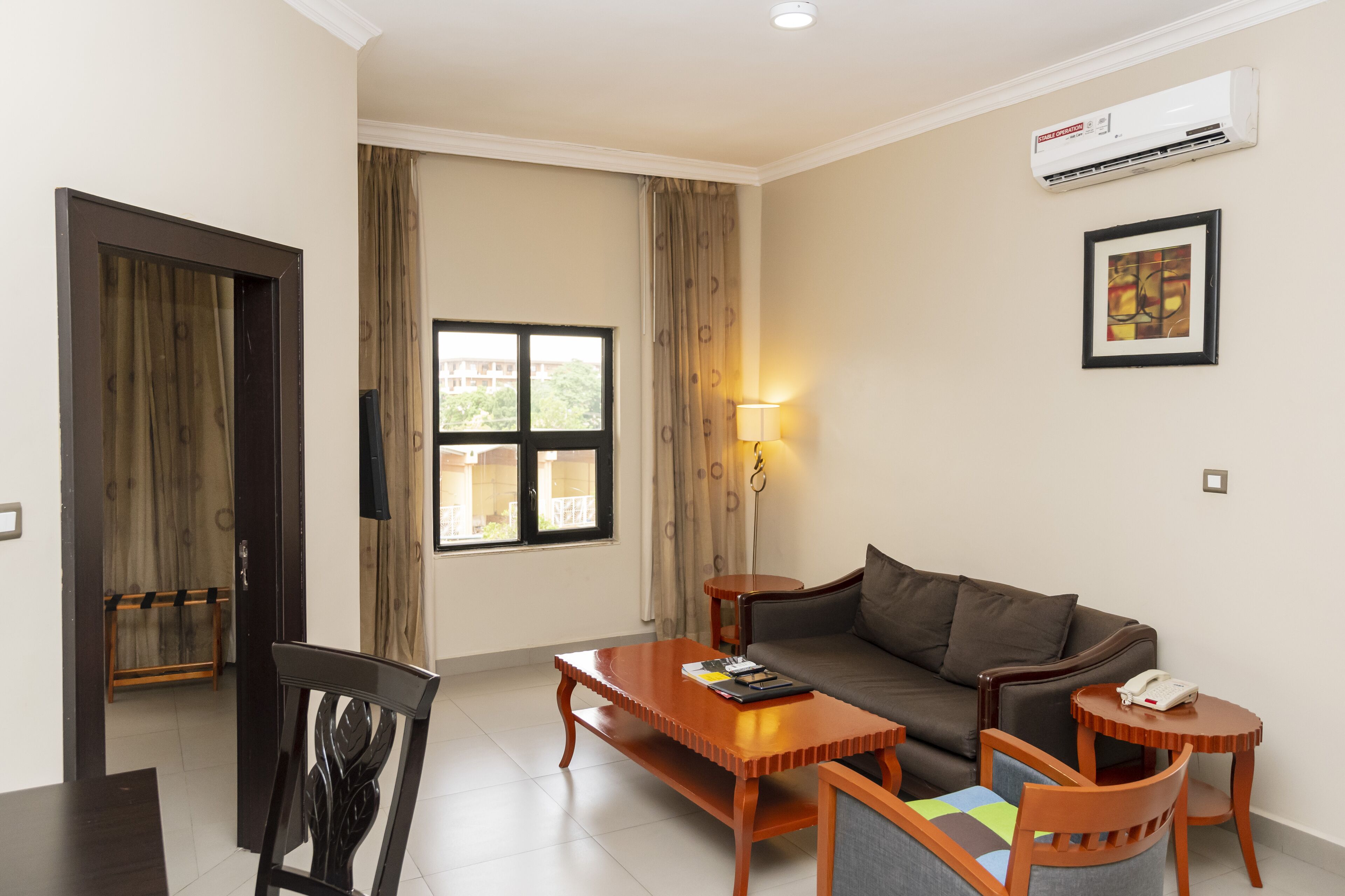 Standard Suite, 1 King Bed | Living area | 32-inch flat-screen TV with cable channels, LCD TV, pay movies