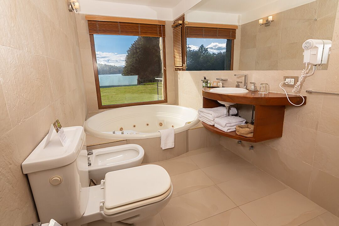 Separate tub and shower, jetted tub, rainfall showerhead
