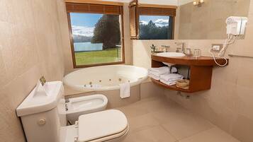 Separate tub and shower, jetted tub, rainfall showerhead