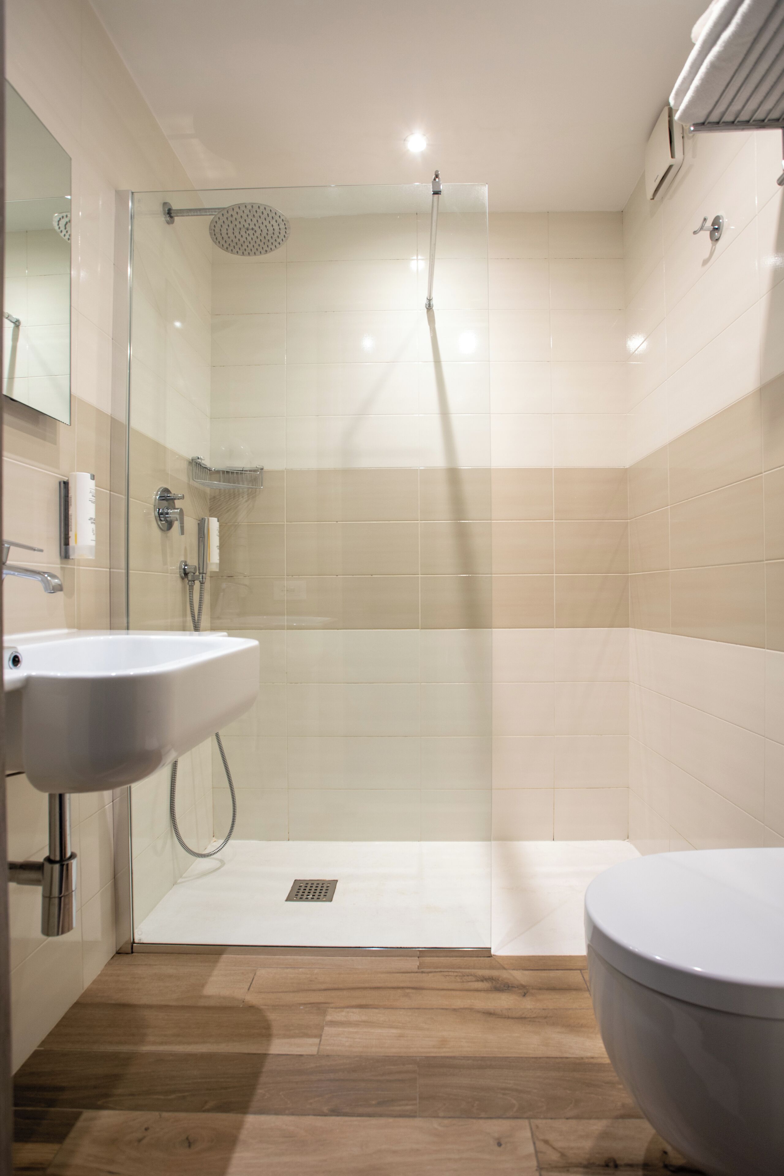 family room | bathroom | shower, hair dryer, bidet, towels