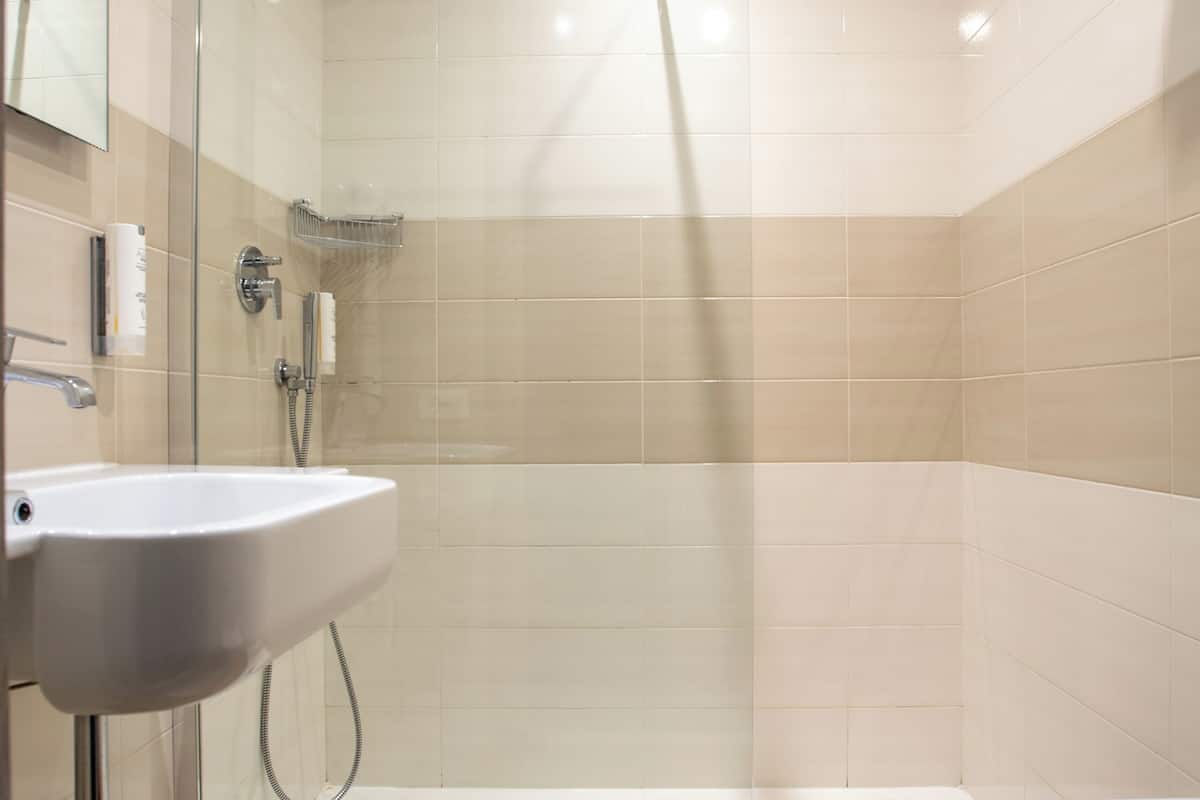 family room | bathroom | shower, hair dryer, bidet, towels