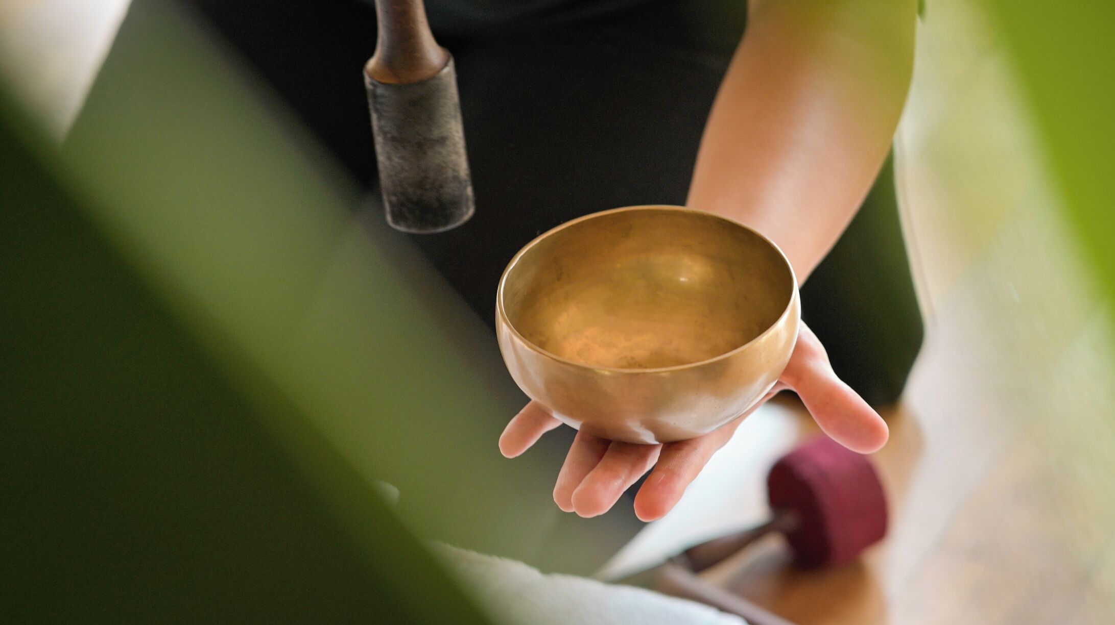 A person holding a bowl.