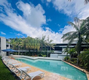 Outdoor pool, pool umbrellas, pool loungers