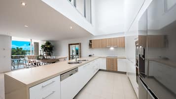 Four Bedroom Two Level Top Floor Luxe Spa Penthouse | Private kitchen | Full-size fridge, microwave, oven, stovetop