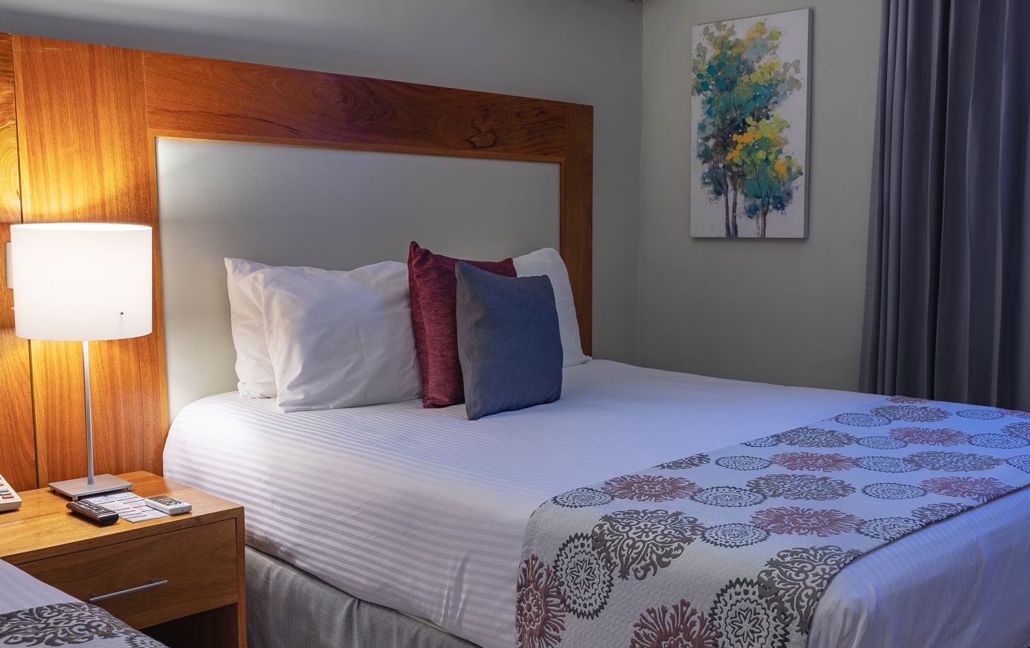 deluxe room | in-room safe, individually decorated, individually furnished, desk