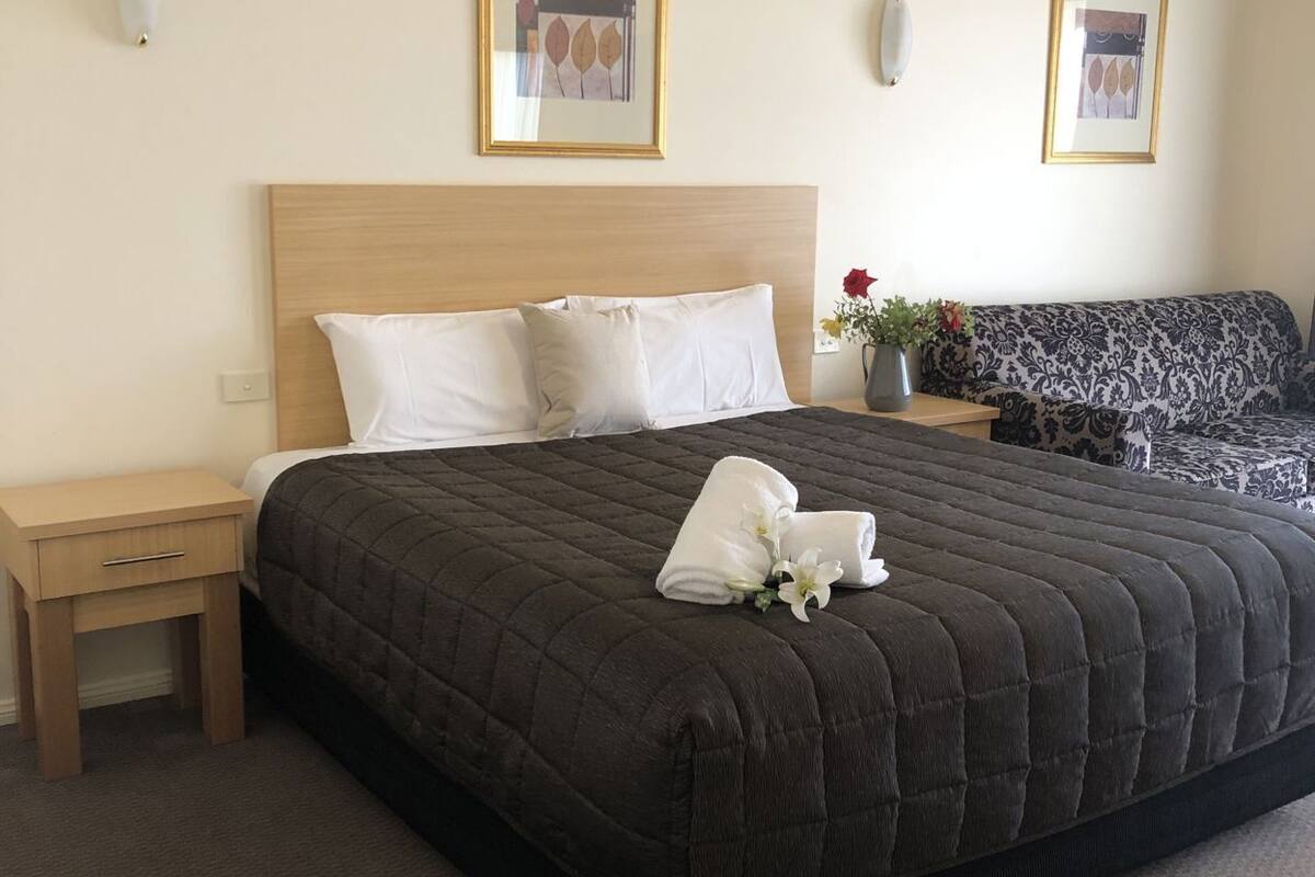 Minibar, desk, laptop workspace, iron/ironing board