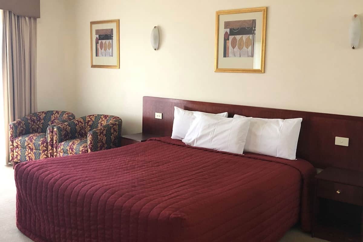 Minibar, desk, laptop workspace, iron/ironing board