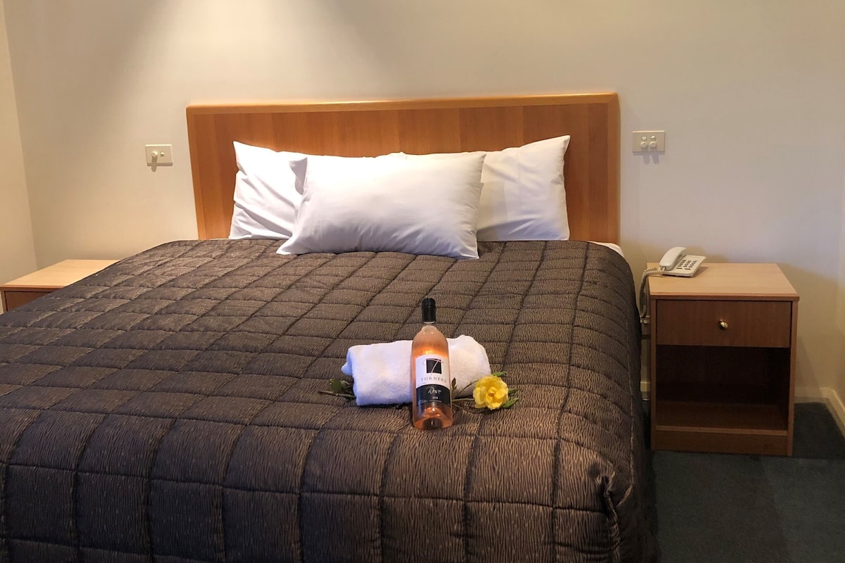 Minibar, desk, laptop workspace, iron/ironing board