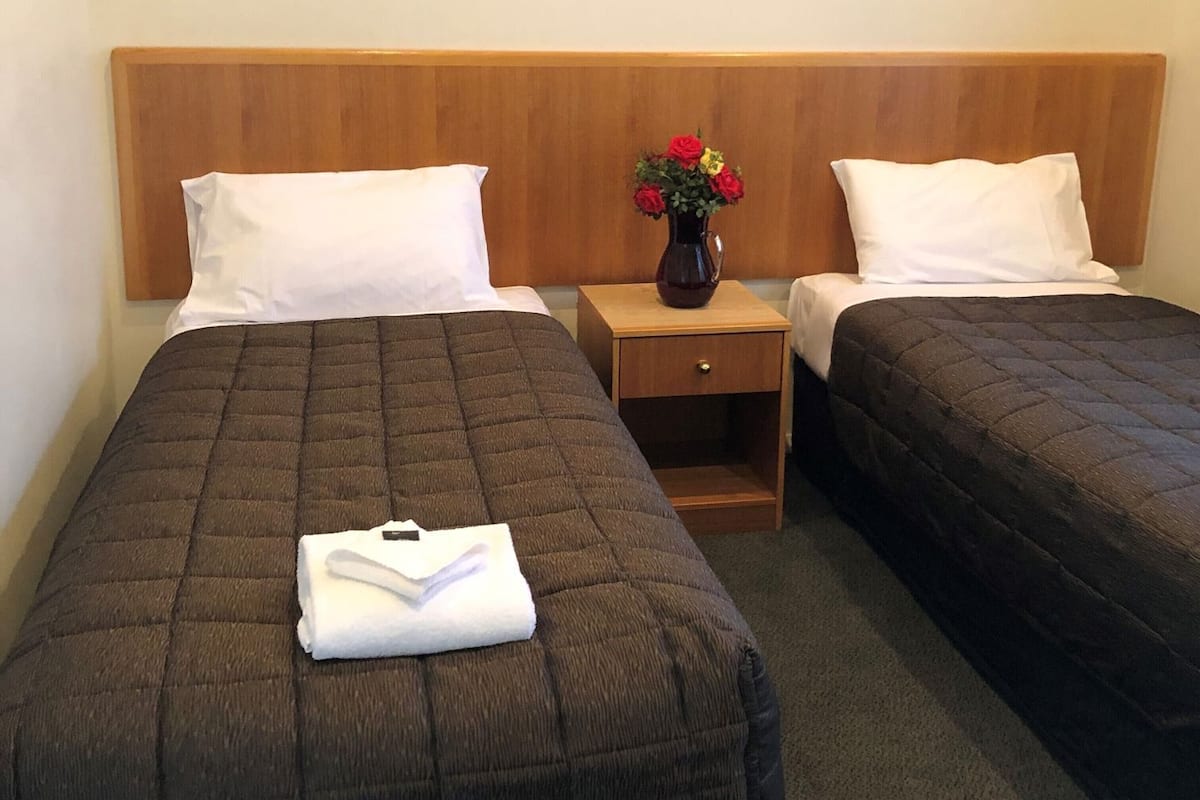 Minibar, desk, laptop workspace, iron/ironing board