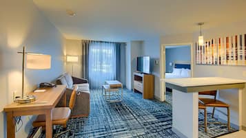 Studio Suite, 1 King Bed | Living area | 37-inch flat-screen TV with cable channels, TV