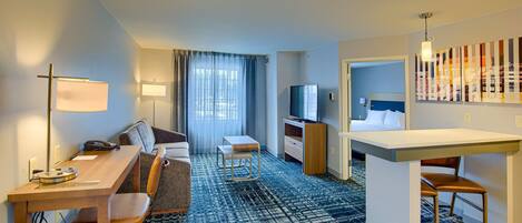 Studiosuite, 1 King-Bett | Wohnbereich