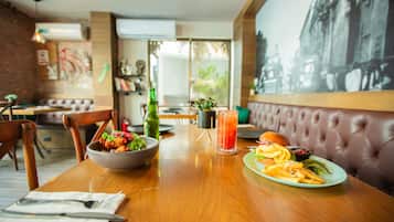 Breakfast, lunch, dinner served; local cuisine