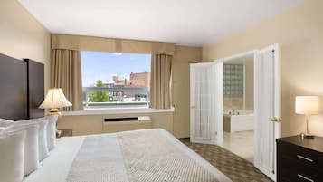 Suite, 1 King Bed, Non Smoking | Pillow-top beds, iron/ironing board, free cots/infant beds