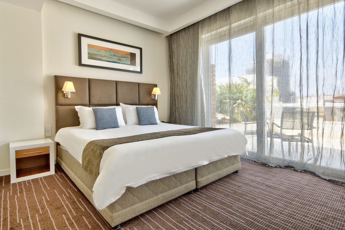 Penthouse | Egyptian cotton sheets, premium bedding, memory-foam beds, in-room safe