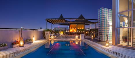 Outdoor pool, pool umbrellas, pool loungers