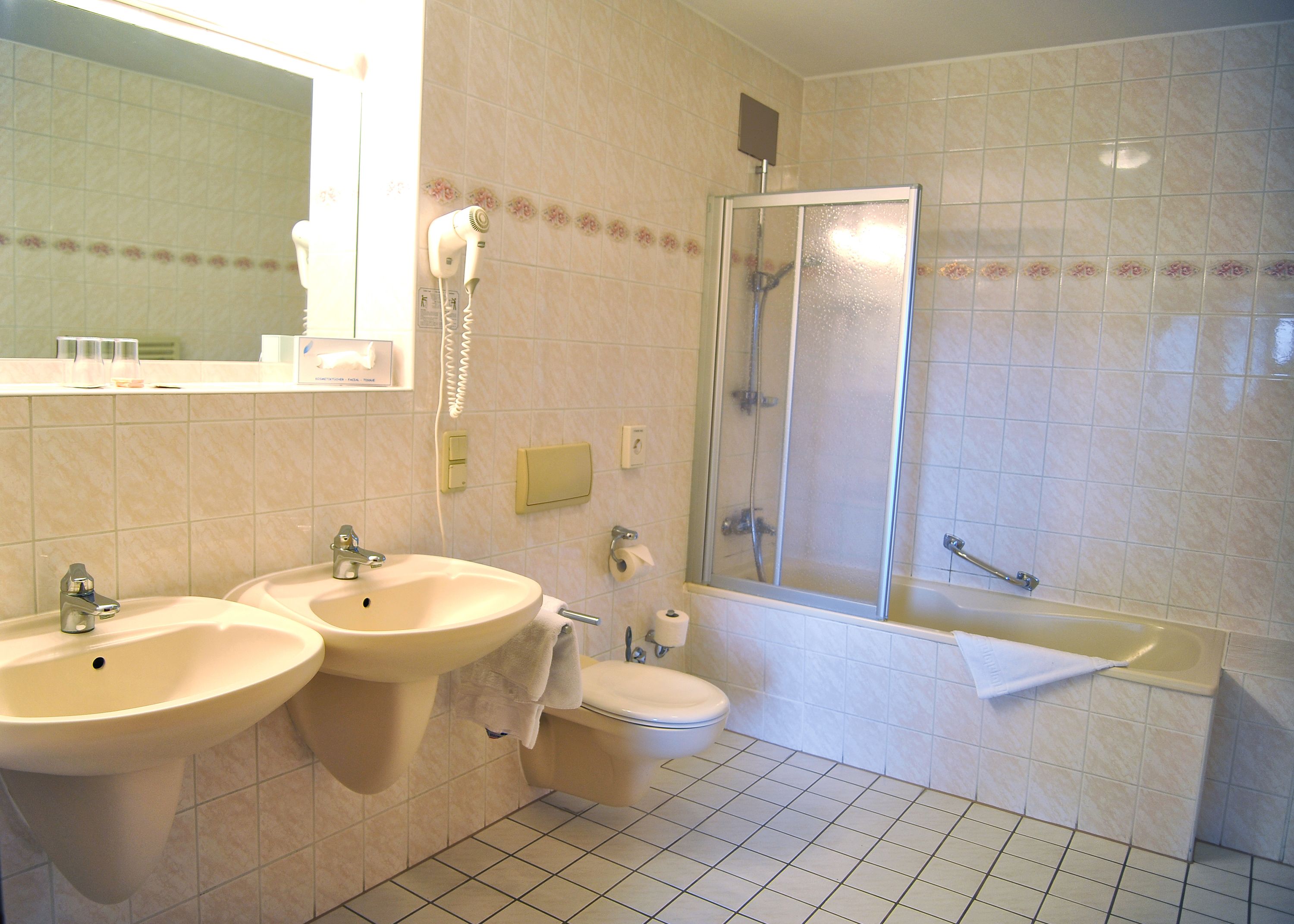 family room | bathroom | shower, free toiletries, hair dryer, towels