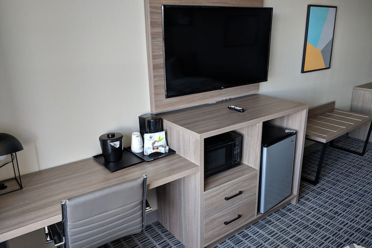 premium bedding, desk, laptop workspace, blackout curtains