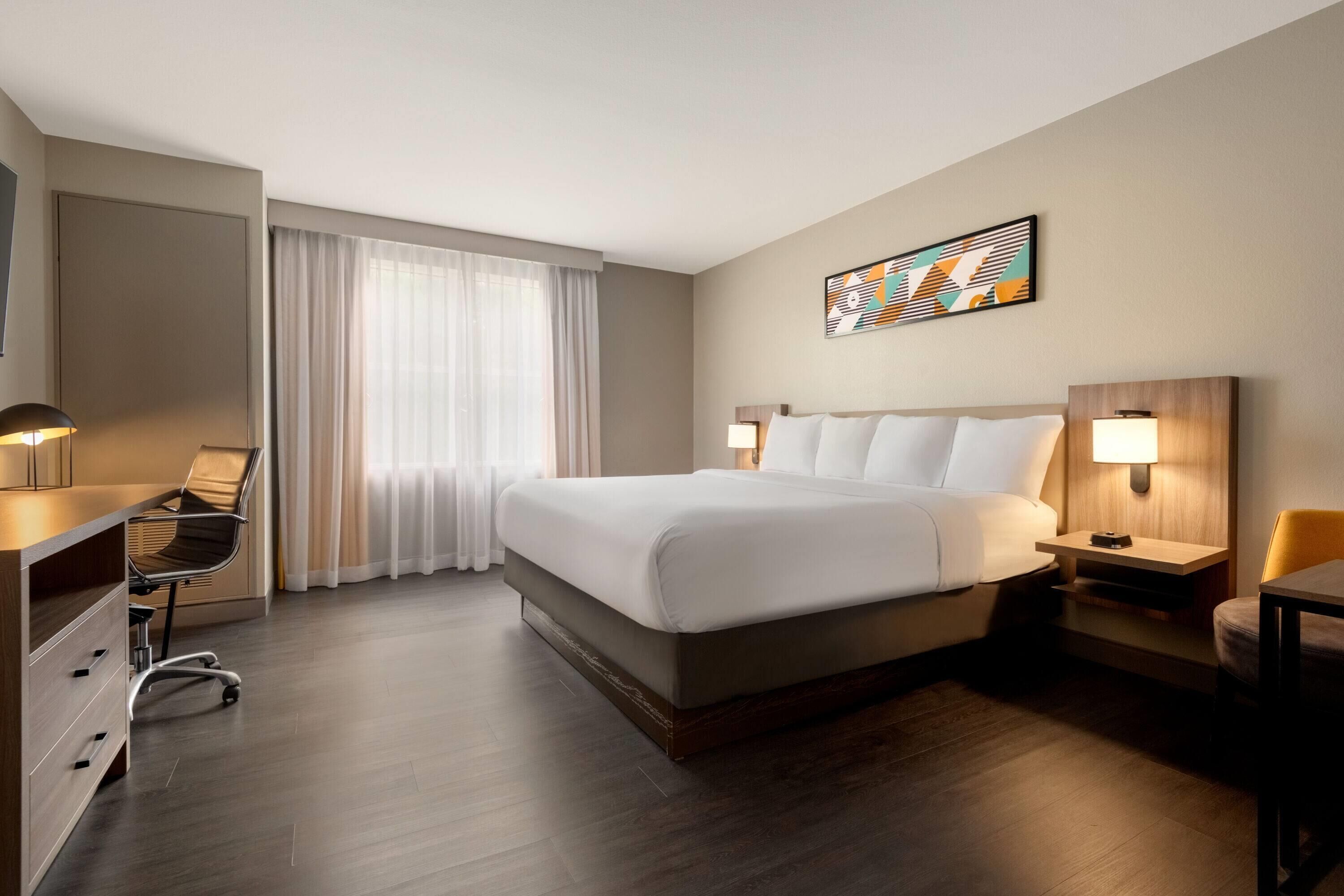 suite, 1 king bed, accessible, non smoking (mobility) | premium bedding, desk, laptop workspace, blackout curtains