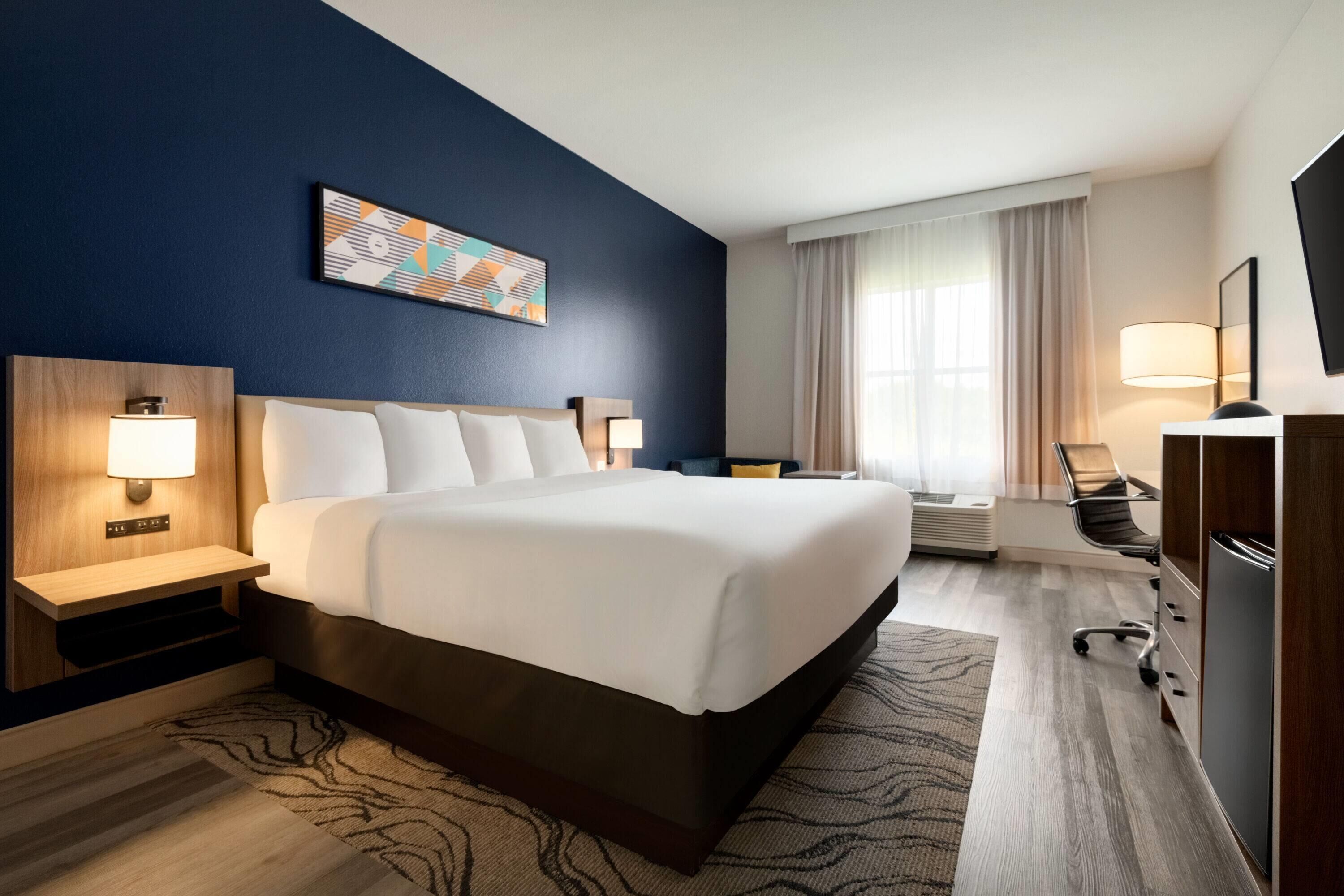 room, 1 king bed, non smoking | premium bedding, desk, laptop workspace, blackout curtains