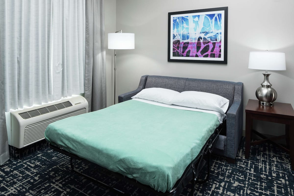 1 bedroom, hypo-allergenic bedding, pillow-top beds, laptop workspace