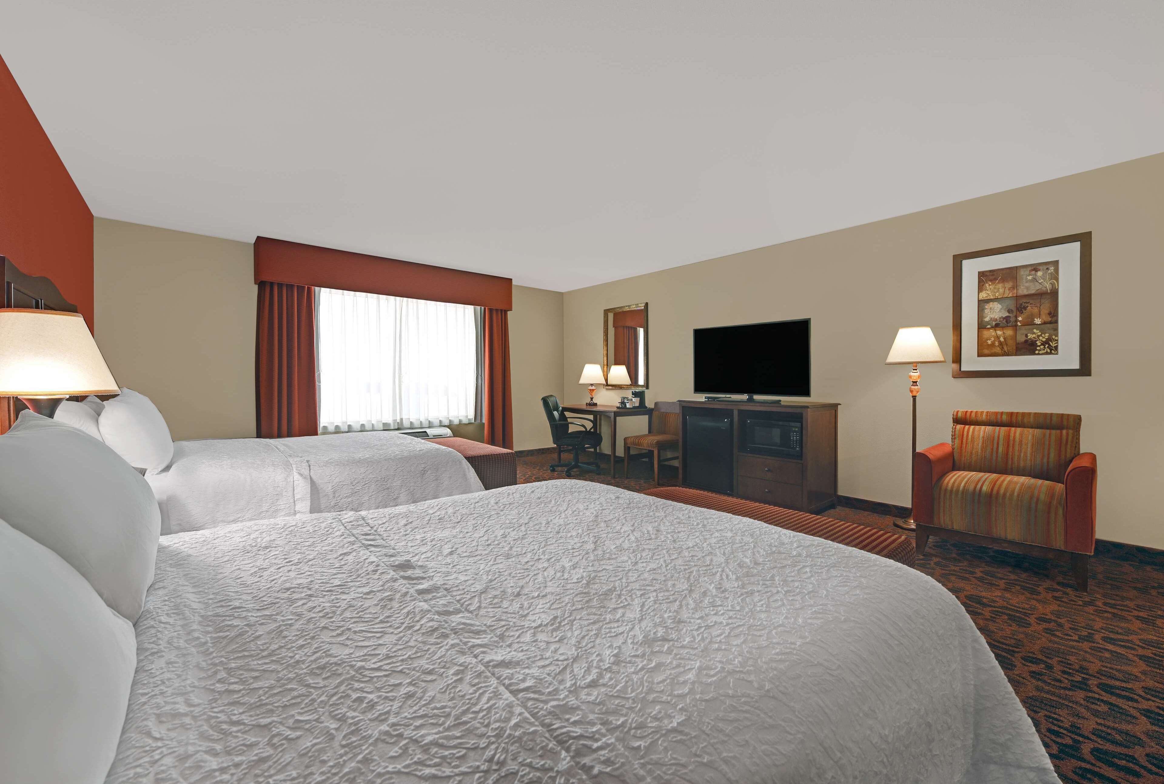 room, 2 queen beds | in-room safe, iron/ironing board, free wired internet, bed sheets