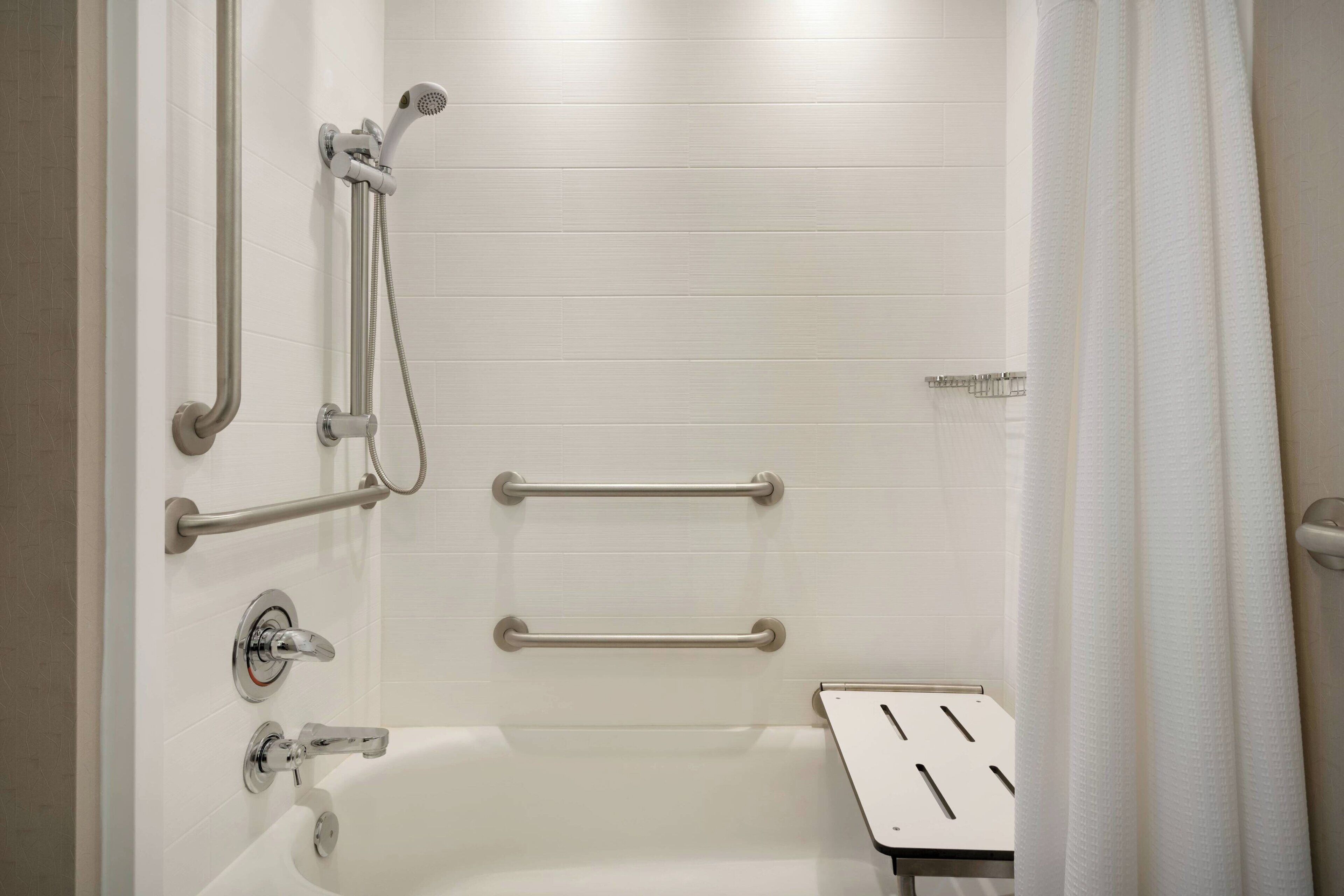 combined shower/bathtub, free toiletries, hair dryer, towels