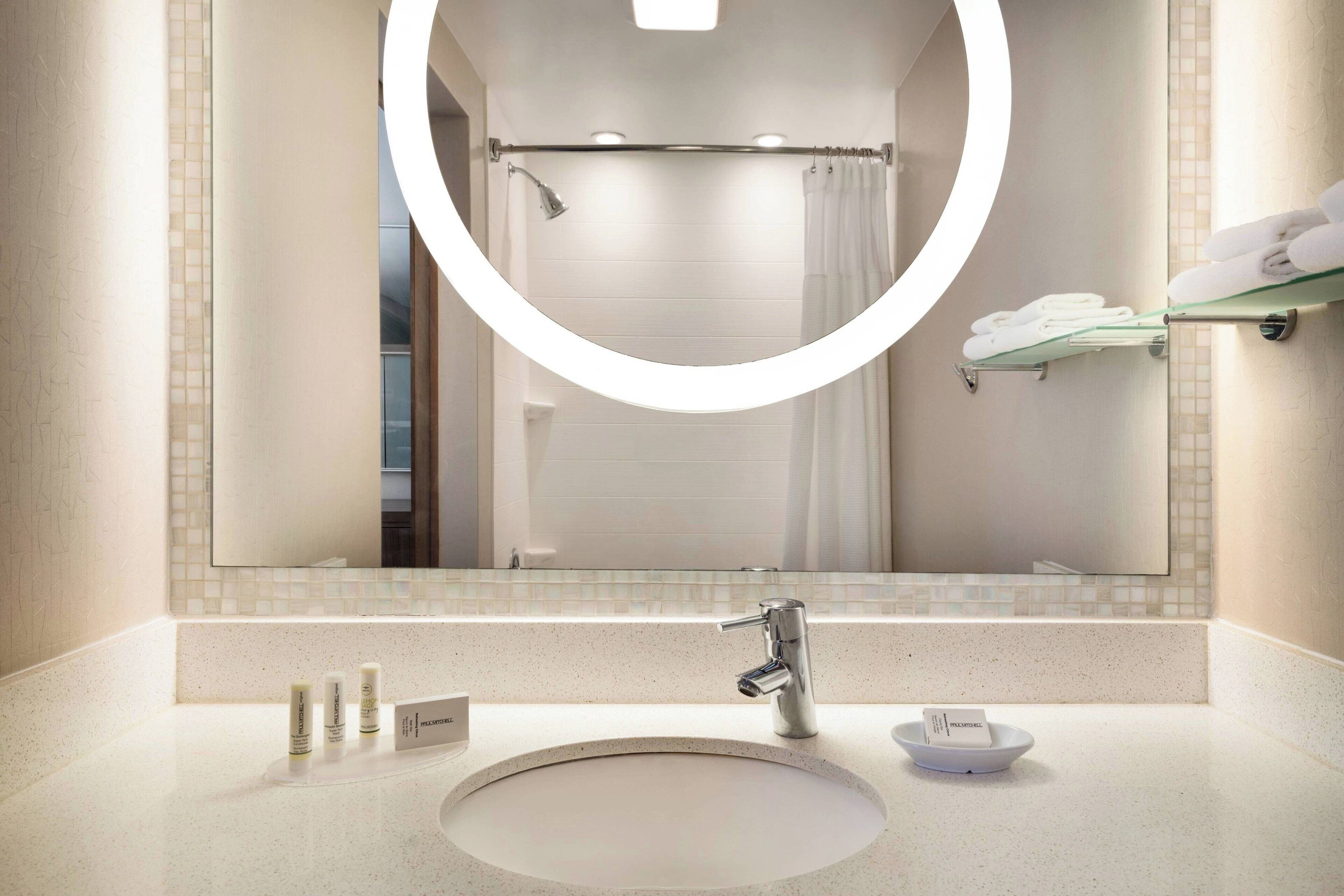 combined shower/bathtub, free toiletries, hair dryer, towels