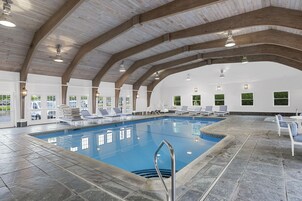 Indoor pool, seasonal outdoor pool, pool umbrellas, sun loungers