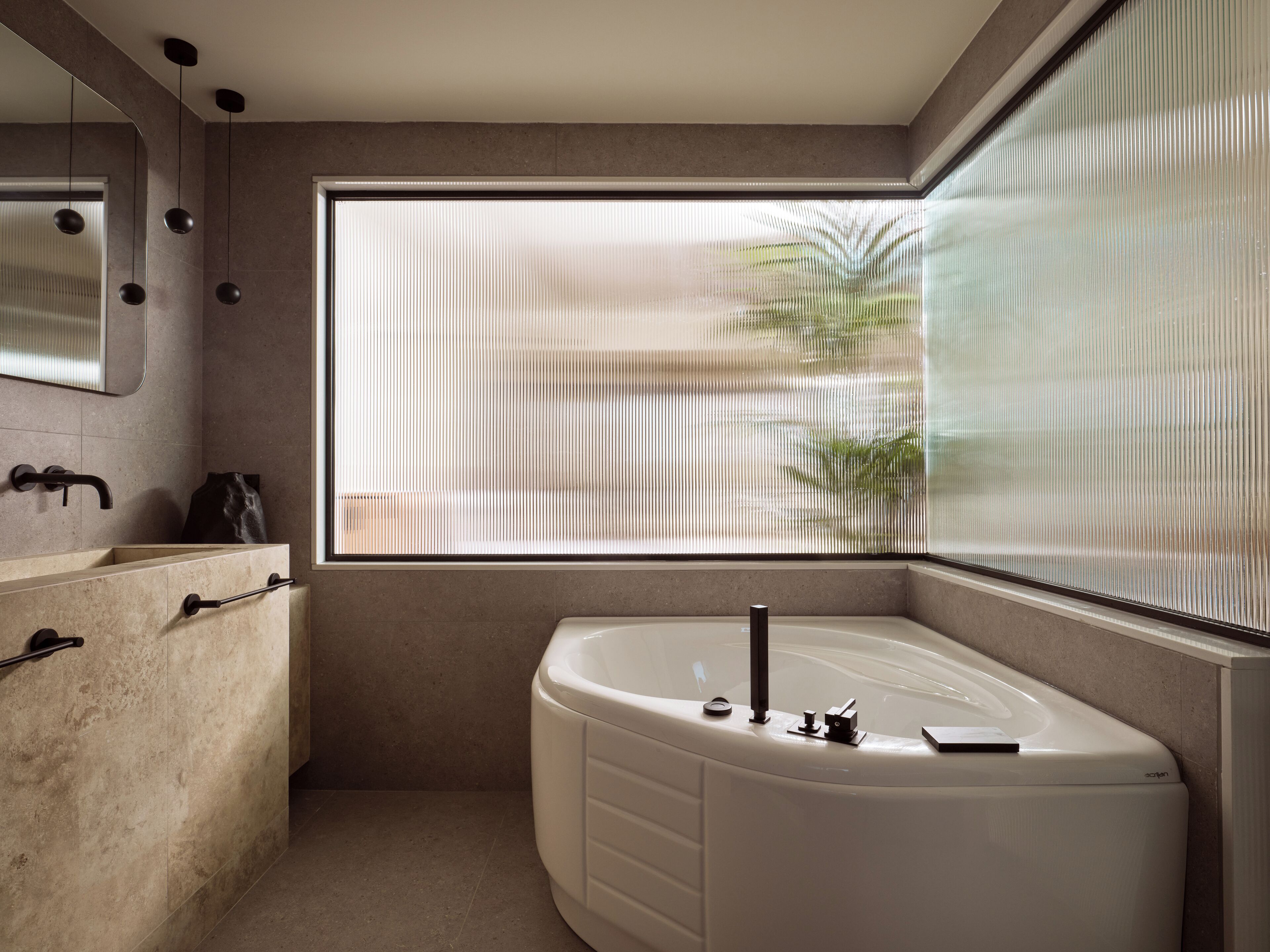 superior suite, jetted tub | bathroom | hair dryer, bathrobes, slippers, towels