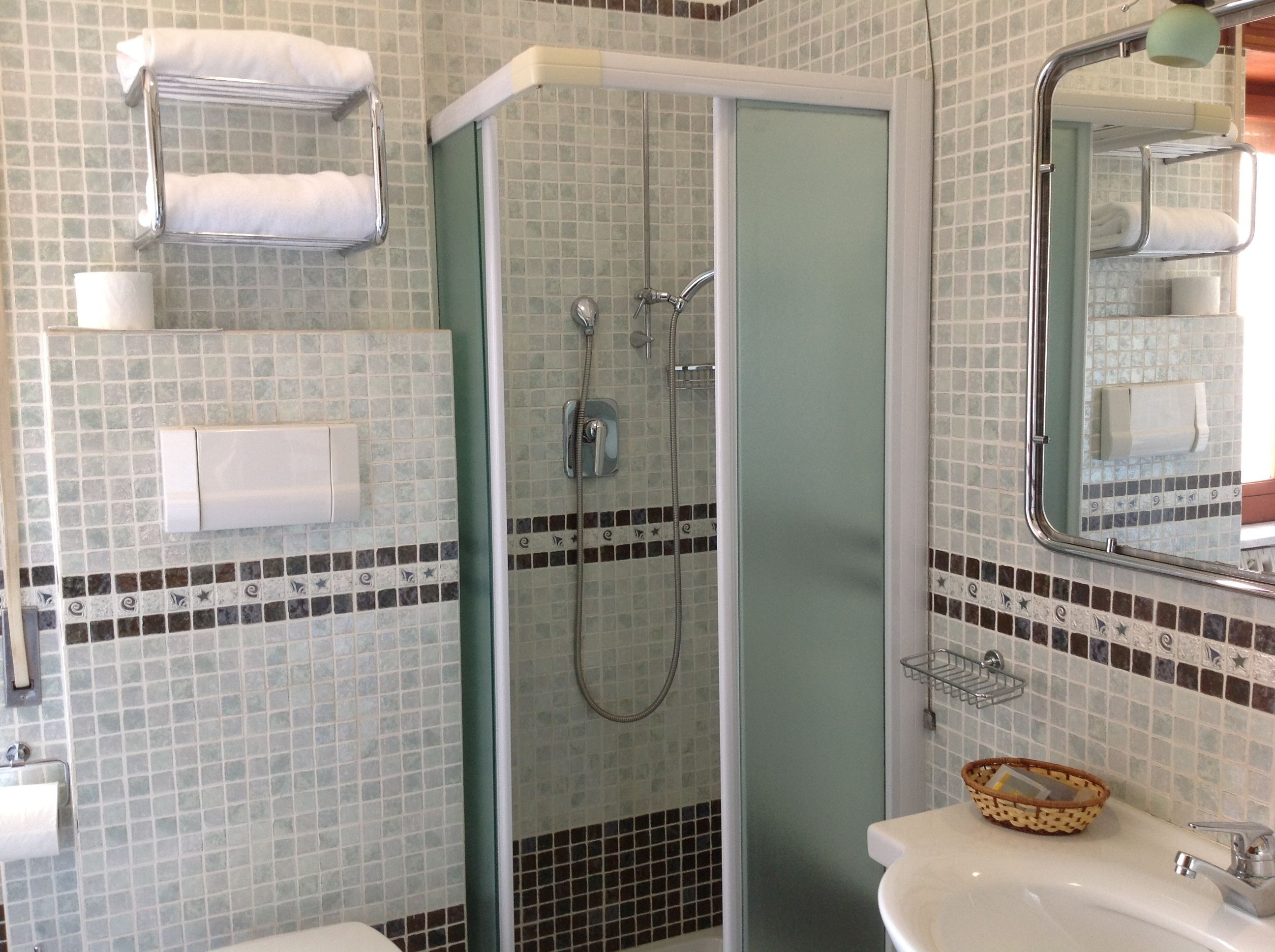 quadruple room | bathroom | rainfall showerhead, free toiletries, hair dryer, slippers