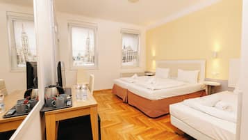 Standard Triple Room | 1 bedroom, in-room safe, desk, blackout curtains