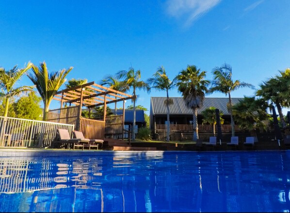 Outdoor pool, pool umbrellas, pool loungers