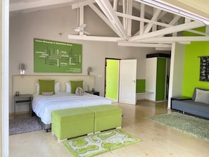 Boutique Green Monkey Orange Sleeps 4  | Premium bedding, individually decorated, individually furnished