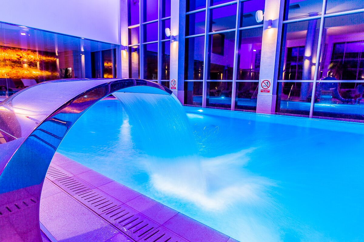 Indoor pool, open 8 AM to 10 PM, pool loungers