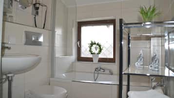 Shower, free toiletries, hair dryer, towels