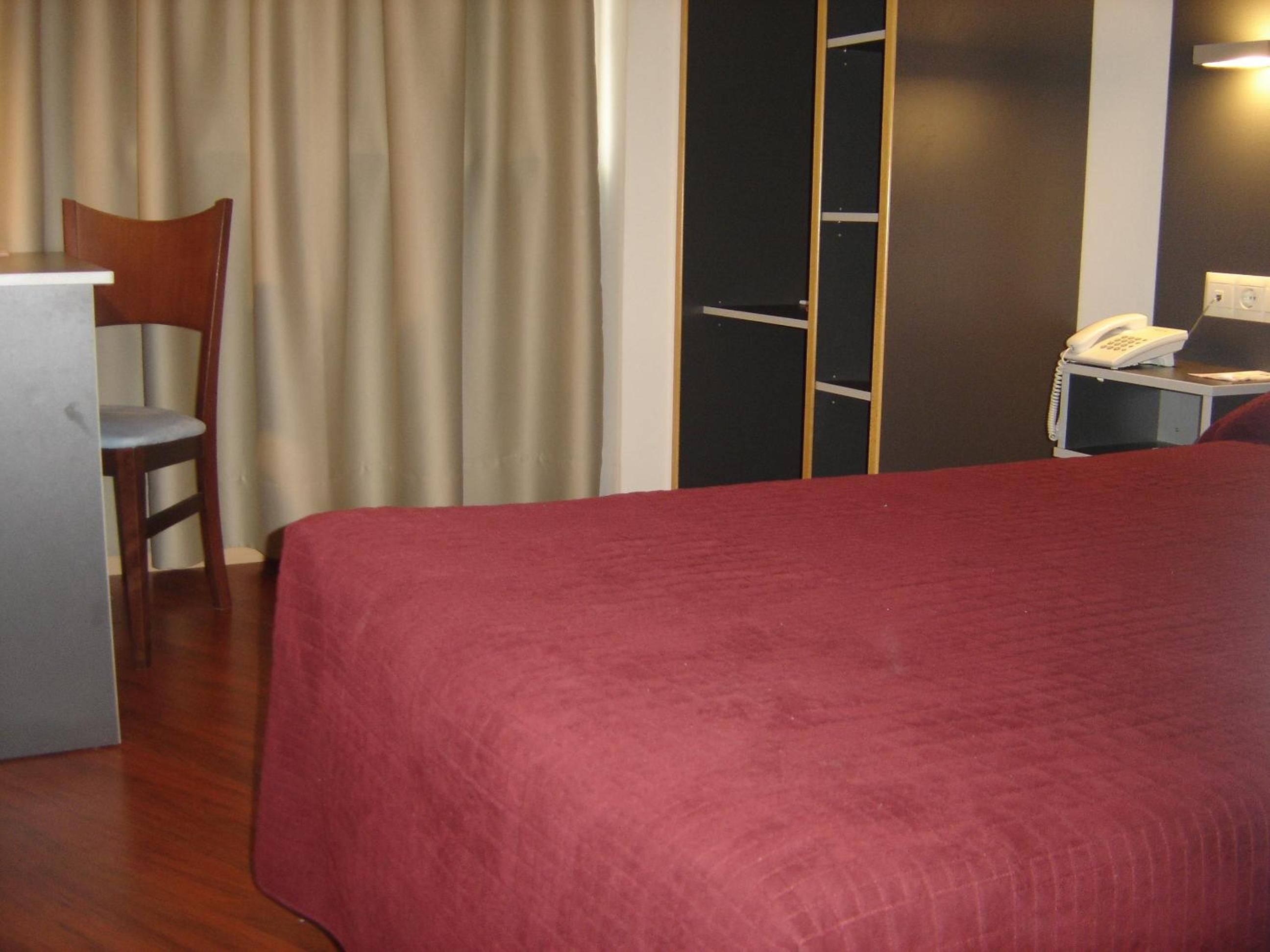 premium bedding, in-room safe, desk, free cots/infant beds