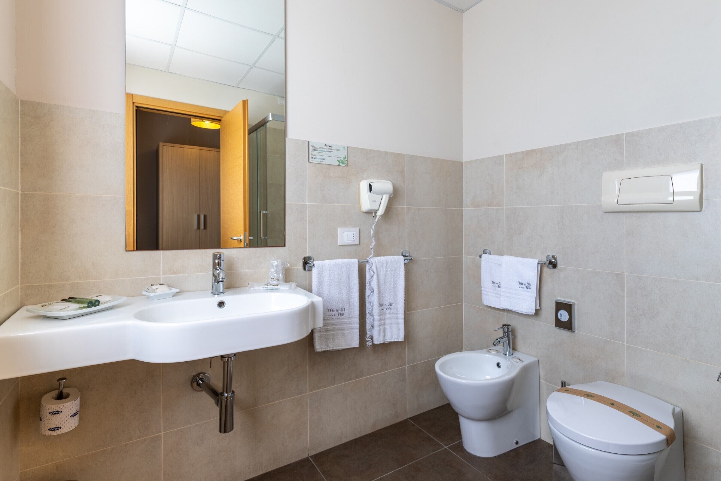 standard double or twin room | bathroom | designer toiletries, hair dryer, bathrobes, slippers