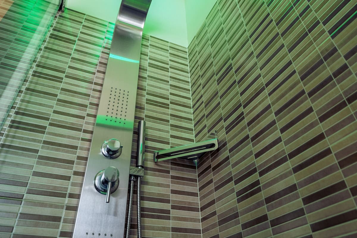 romantic studio suite, 1 queen bed, sauna, sea view | bathroom | designer toiletries, hair dryer, bathrobes, slippers
