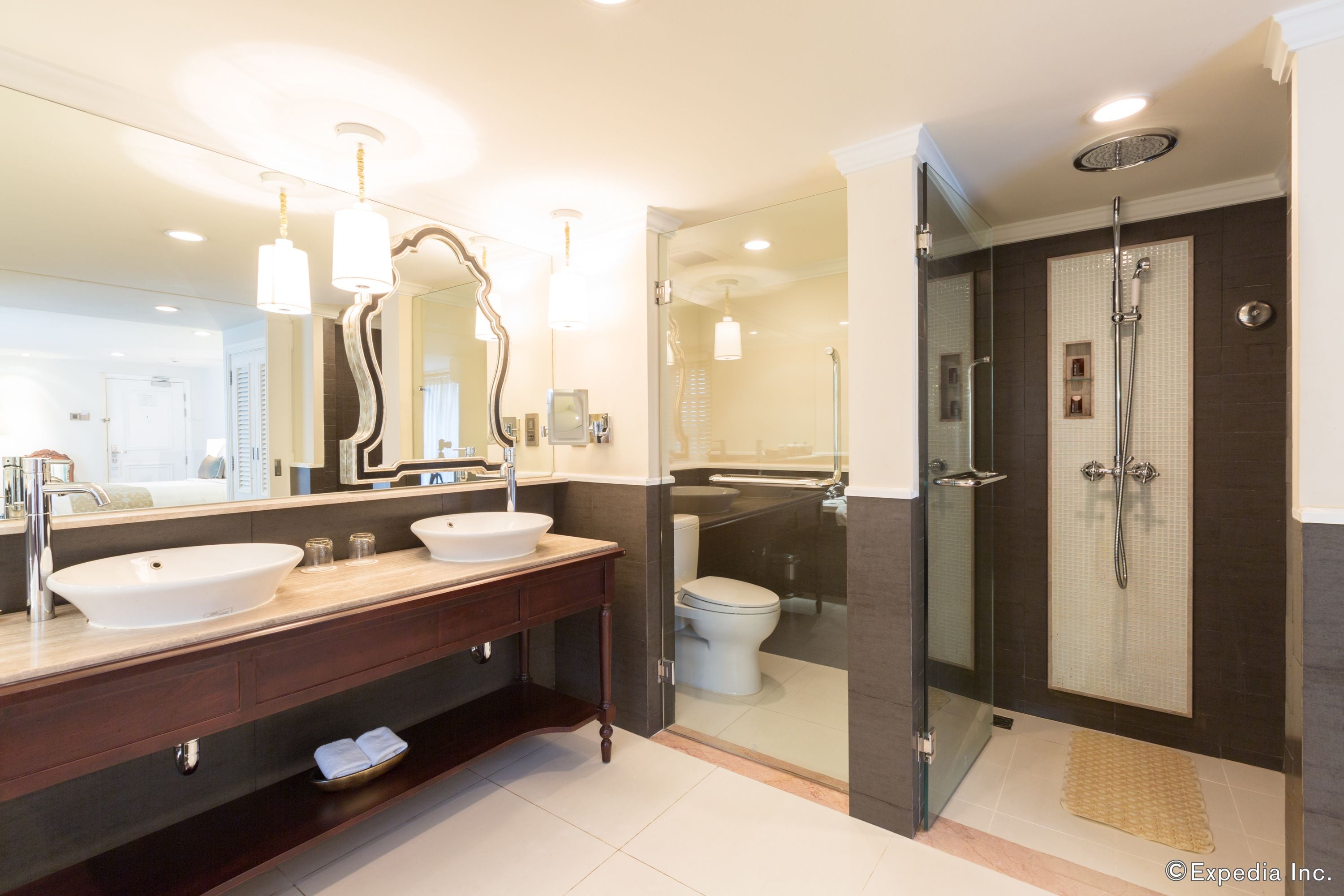 sanctuary room | bathroom | designer toiletries, hair dryer, bathrobes, slippers