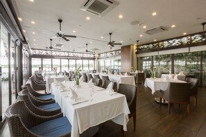 Breakfast, lunch, dinner served; Fusion cuisine, garden views