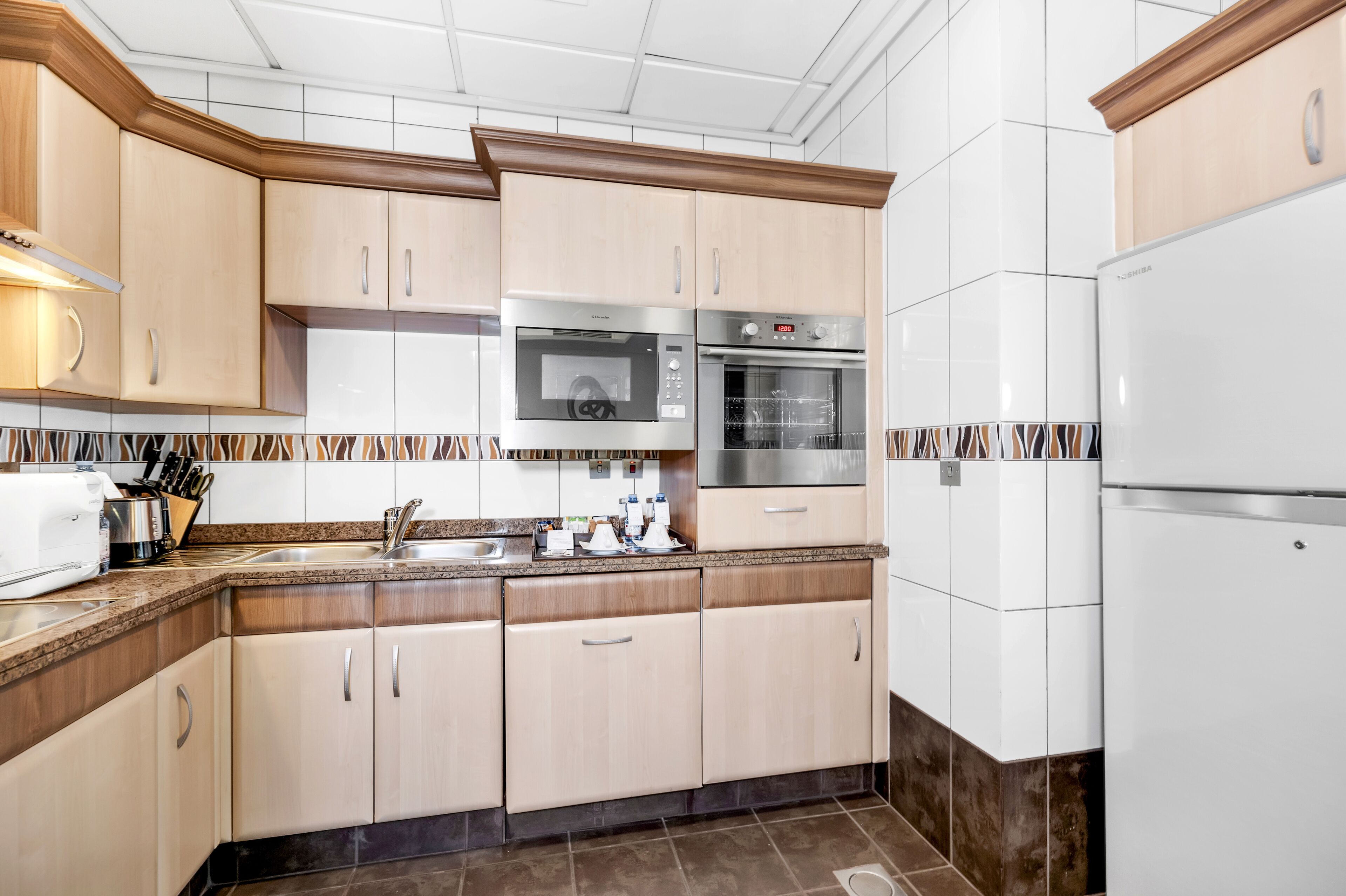suite (superior one bedroom) | private kitchen | full-sized fridge, microwave, espresso maker, cookware/dishes/utensils
