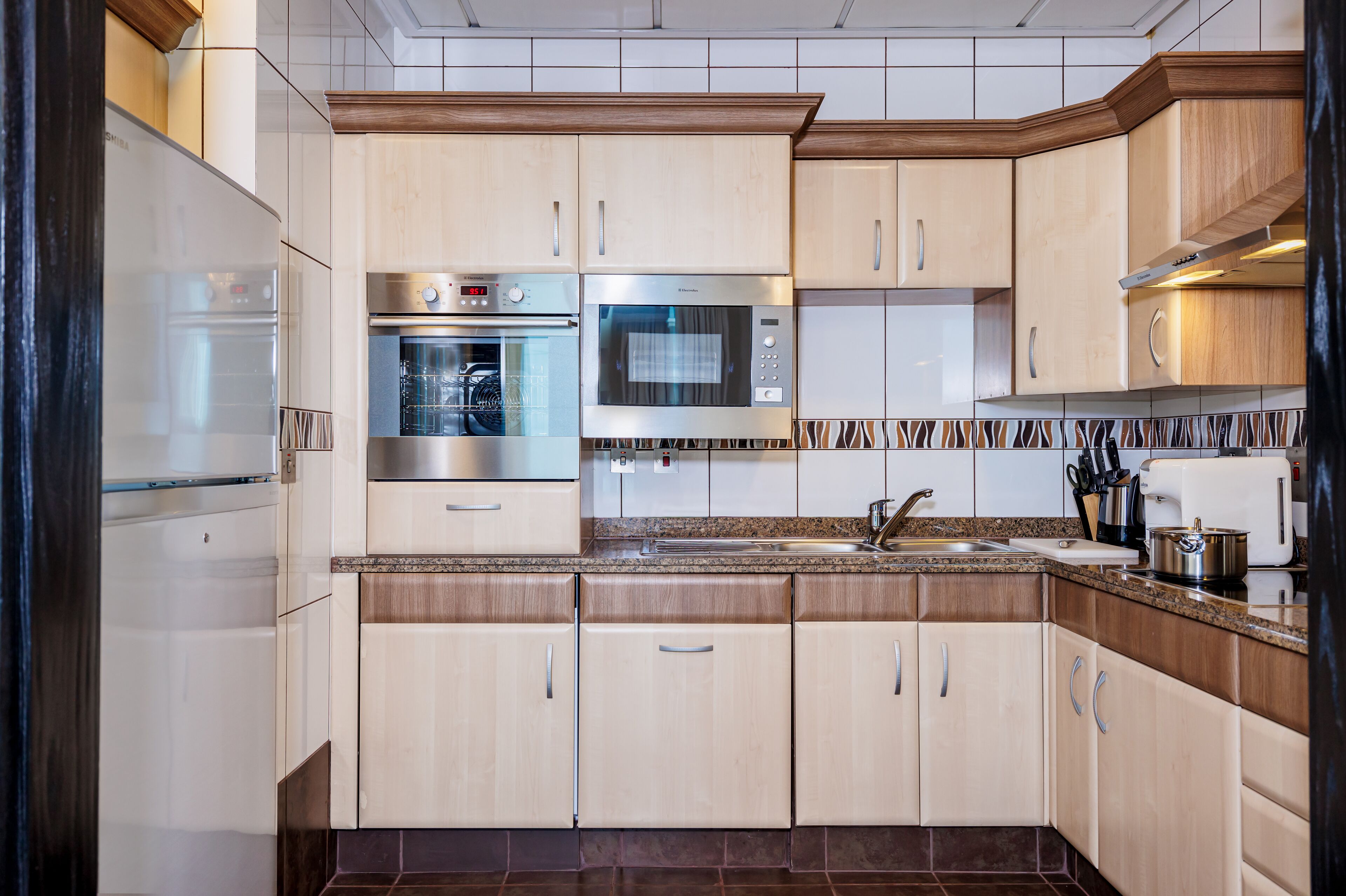 suite (deluxe one bedroom) | private kitchen | full-sized fridge, microwave, espresso maker, cookware/dishes/utensils