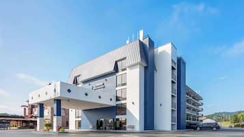 Experience the unique architectural design of this hotel, featuring a striking overhang and geometric pattern.