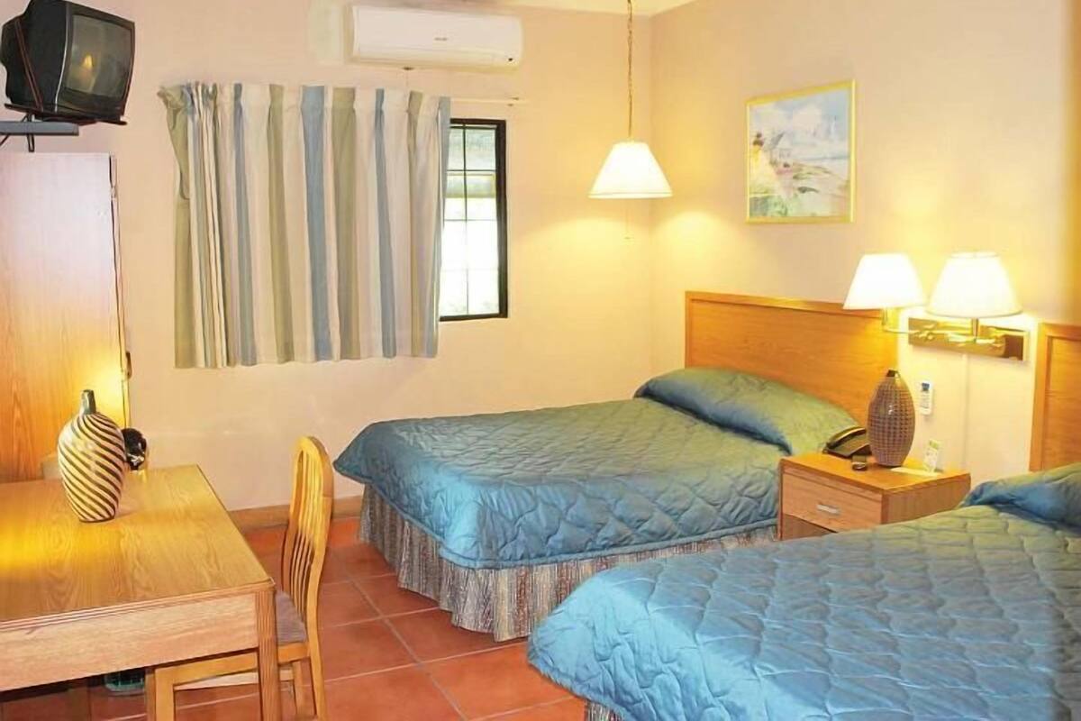 Double Room | Minibar, in-room safe, desk, blackout curtains