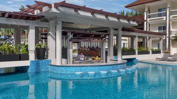 Outdoor pool, free cabanas, pool umbrellas