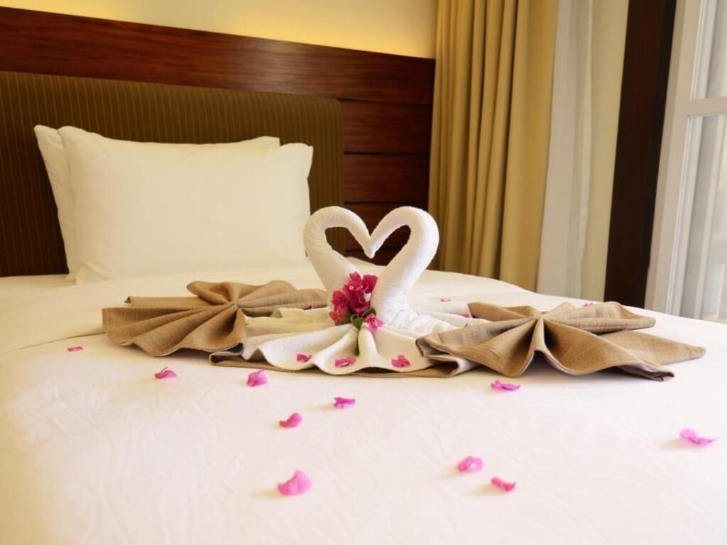 Premium bedding, down duvets, in-room safe, desk