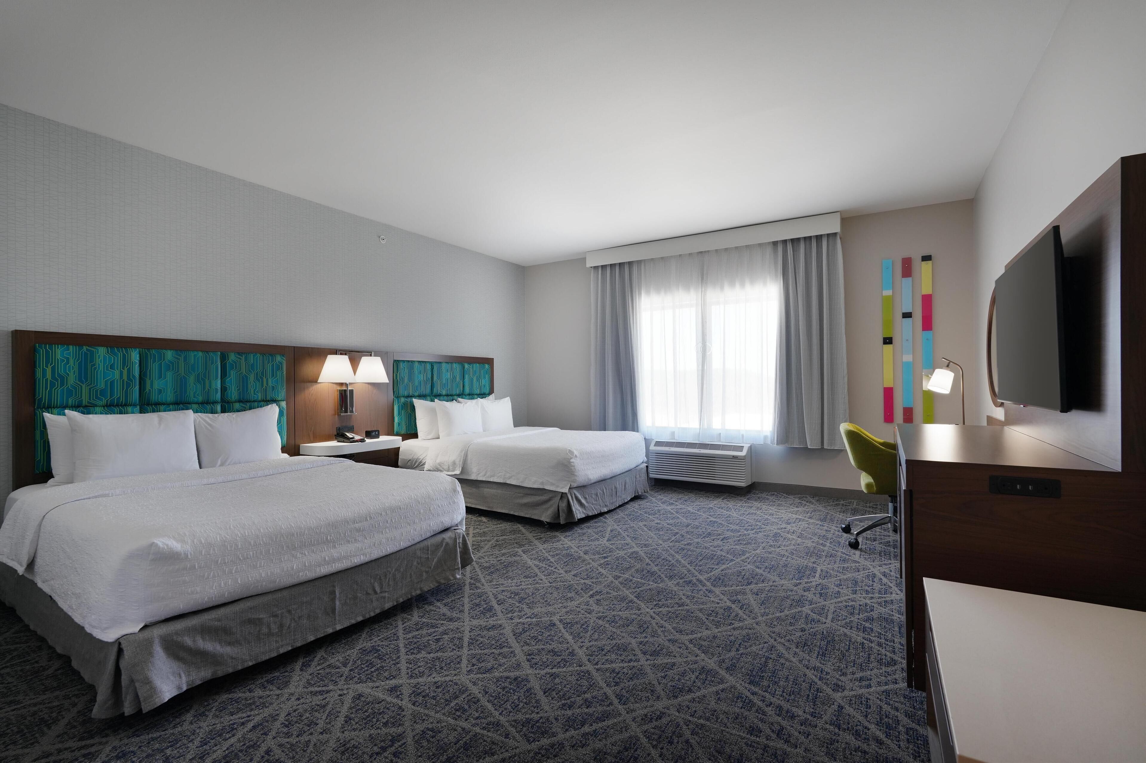 room, 2 queen beds, accessible, non smoking | in-room safe, desk, iron/ironing board, free cots/infant beds