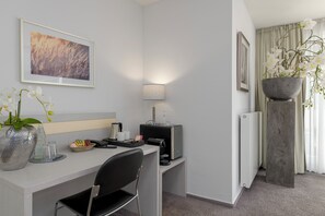 Suite presidencial | Colchones con acolchado adicional y tabla de planchar con plancha