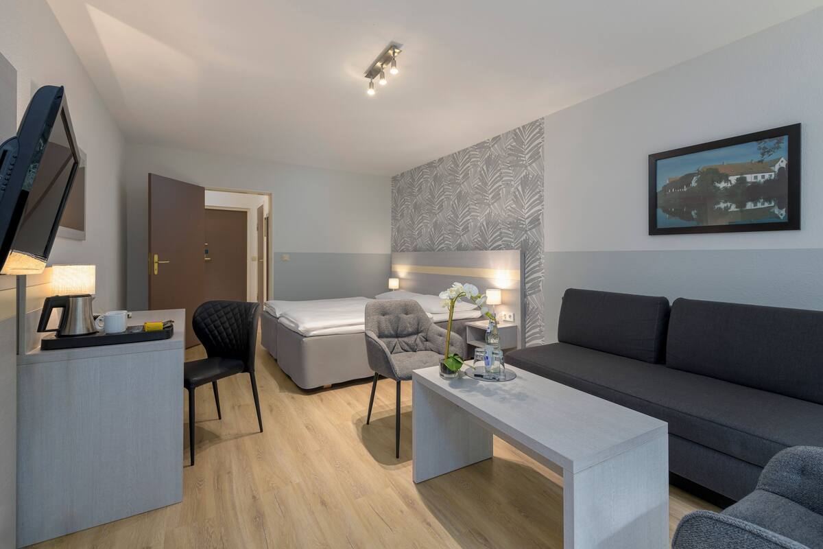 Pillowtop beds, desk, iron/ironing board (on request), WiFi (free)