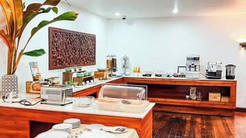 Daily buffet breakfast (USD 8 per person)